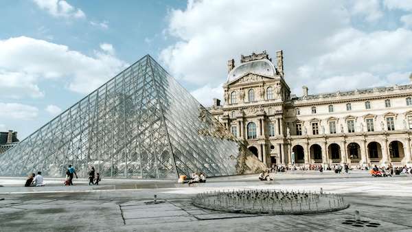 The Louvre Pyramid in the courtyard of The Louvre Palace